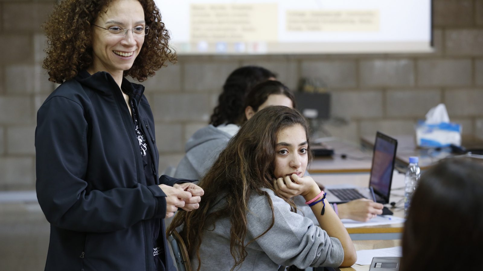 Lebanese teacher Lynn Sakr chats with students during a Media and Information Literacy (MIL) class at the school of Jesus and Mary in the Rabweh area, northeast of Beirut, Lebanon.