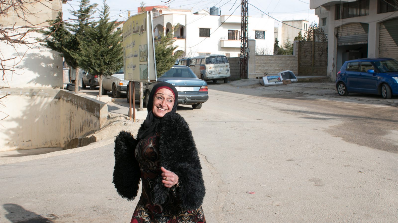 Souhayla beneficiary of the EU-funded project Dawric posing in front of her house, Douris, Lebanon