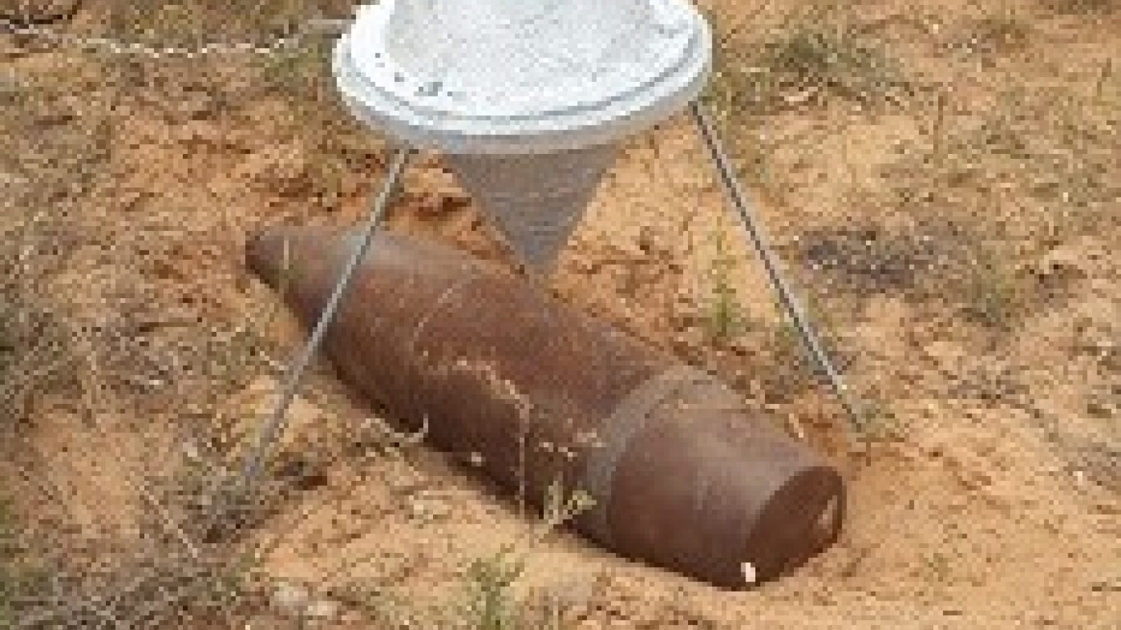 Unexploded ammunition measuring 105mm in diameter 